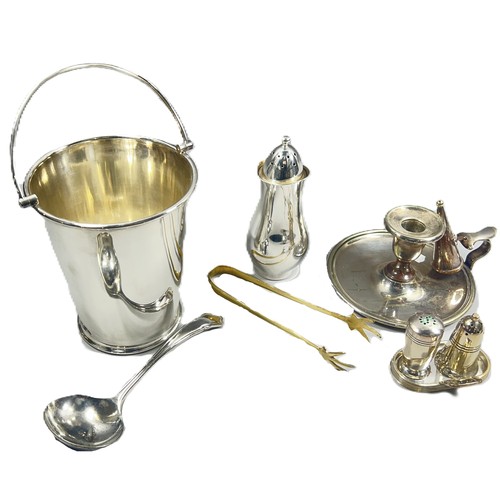 289 - A collection of silver plated flatware, ice bucket, entrée dish, caster two ladles and a chamber sti... 