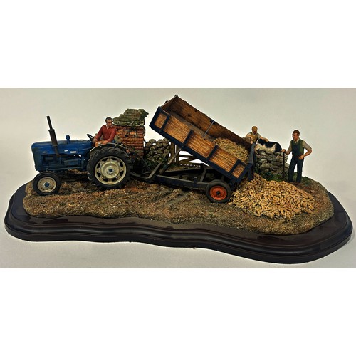 4 - A Country Artists detailed model depicting a tractor and trailer tipping parsnips into a field with ... 