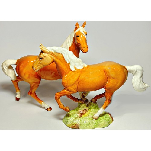 72 - Four Beswick Palomino type horse figures in various poses (4)