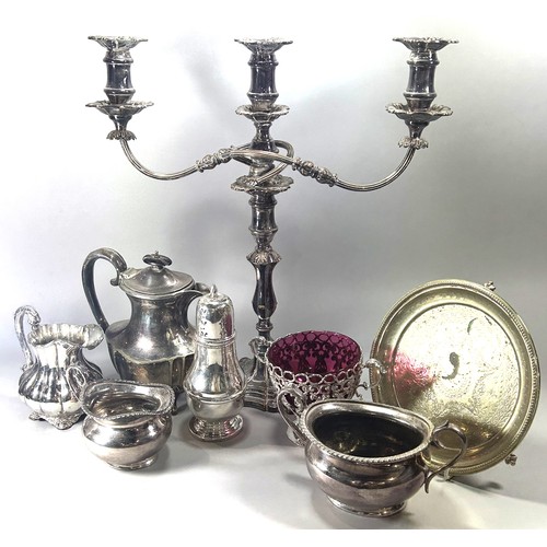 284 - A miscellaneous collection of silver plate to include a large silver plated spirit kettle and stand,... 