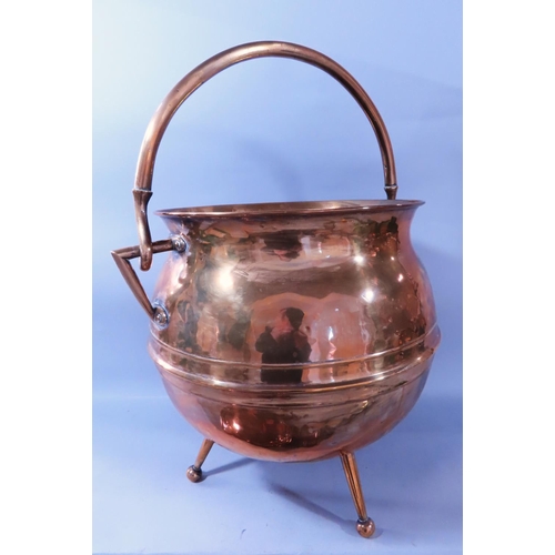 632 - A 19th century brass coal scuttle, a brass cauldron, copper warming pan and a selection of fireside ... 