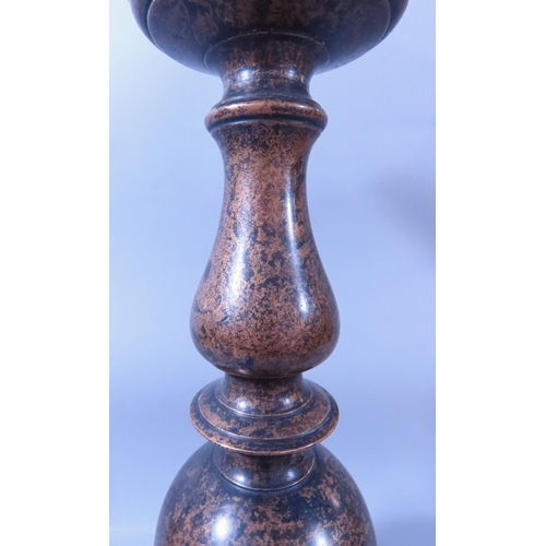 642 - A SUBSTANTIAL BURNISHED BRONZE BALLUSTER SHAPED CANDLESTICK 50CM HIGH