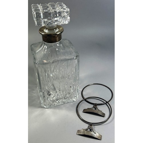 273 - A glass decanter with silver collar and two silver drink labels unmarked