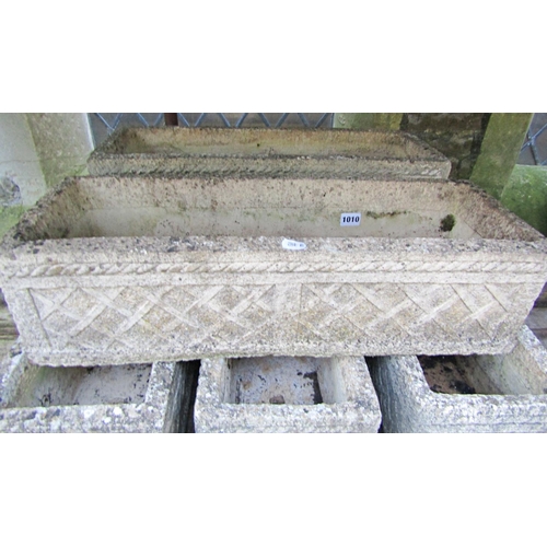 1010 - Five weathered cast composition stone rectangular flower troughs with lattice detail, 17 cm high x 6... 