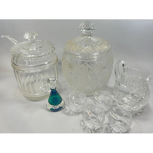 272 - A large cut glass punch bowl with cover and ladle and four glasses a large cut glass storage jar, a ... 