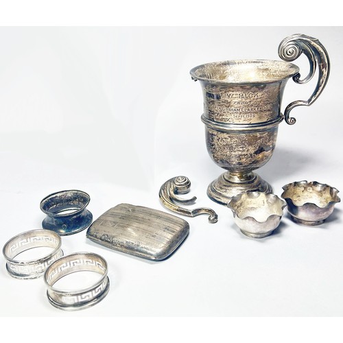 312 - A mixed selection of silver including a case Christening spoon, a cased condiment set, case teaspoon... 