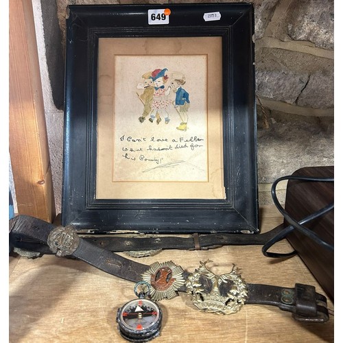 649 - A small WWI character watercolour and a belt with military badges, a compass.