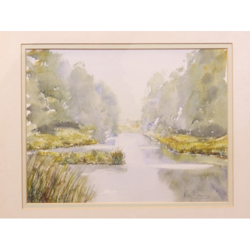 57 - Richard Manning: River landscape with houses beyond, watercolour, signed lower right, 29cm x 22cm