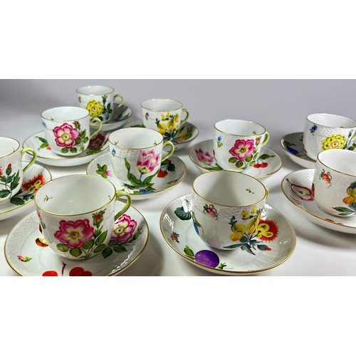 19 - A collection of 10 Herend fruit and floral patterned teacups and saucers