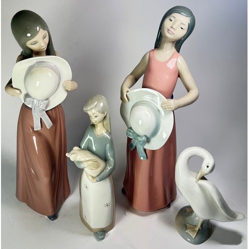 11 - A collection of Lladro including three clown figures and nine character figurines and a goose