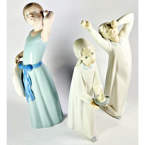 11 - A collection of Lladro including three clown figures and nine character figurines and a goose