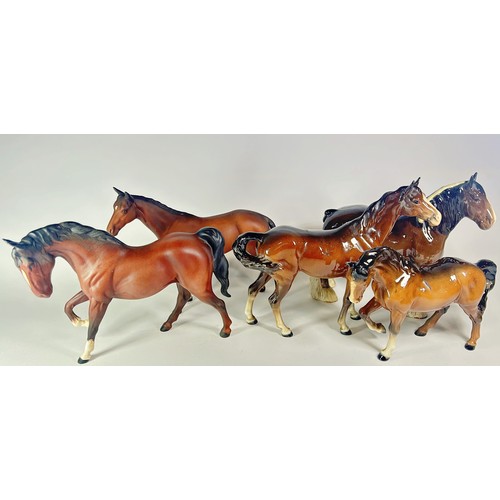 55 - A collection of Beswick horses and foals, in various sizes and poses (10)