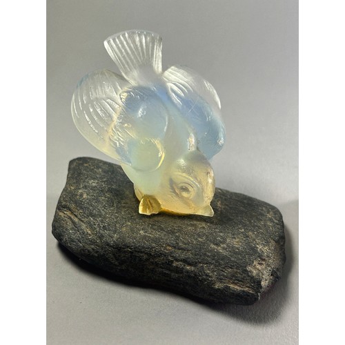 186 - Two Sabino glass doves one perched on a wood plinth, the other on a pebble, both 5cm high appro