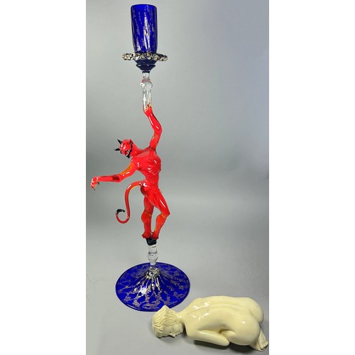 189 - A glass candlestick with red devil and an alabaster nude (2)