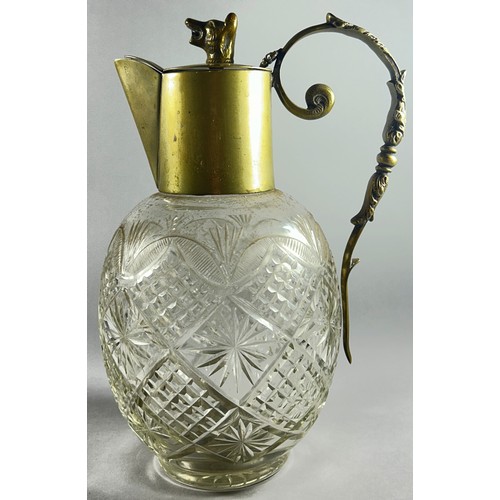 211 - A cut glass claret jug with fox head lid, together with a frosted glass claret jug with a serpentine... 