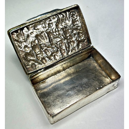 222 - A middle eastern silver cards tin with embossed figures, 7cmx4.5cm and a horn beaker with silver met... 