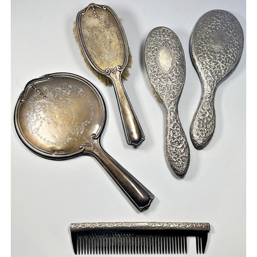 226 - Three piece silver backed dressing set and two others (5)