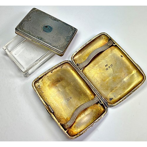 228 - A richly engraved silver cigarette case and a glass trinket box with a silver lid, 3.5oz (2)