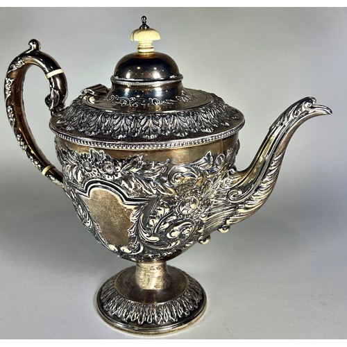 246 - A heavily engraved three piece silver tea service, with scrolling and acanthus leaf detail, Birmingh... 