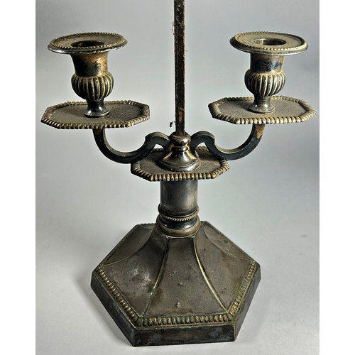 252 - A Silver plated library candlestick with two sconces below an adjustable shade rest, on a hexagonal ... 