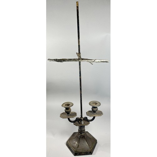 252 - A Silver plated library candlestick with two sconces below an adjustable shade rest, on a hexagonal ... 