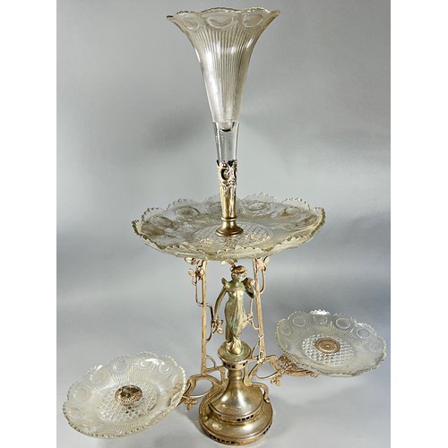 253 - An early 19th century Art Nouveau epergne with a central female figure below a glass tier with trump... 