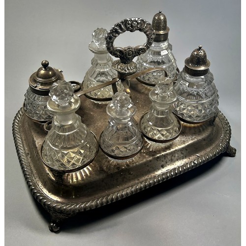 265 - A silver plated table centrepiece condiment stand and a silver plated three decanter stand.