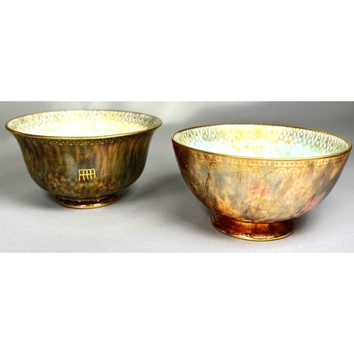 127 - Wedgwood lustre - Two open bowls, similar exterior with mottled tangerine, with either butterfly or ... 