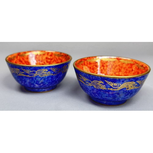 126 - Wedgwood Lustre - pair of small open bowls with mottled blue exteriors and tangerine mottled interio... 