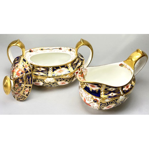 118 - Royal Crown Derby - a small milk jug, old witches pattern 1910, together with a sucrier and cover, o... 