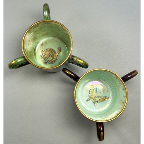 133 - Wedgwood lustre - pair of tygs with mottled green and mauve finish with various butterfly, snake, dr... 