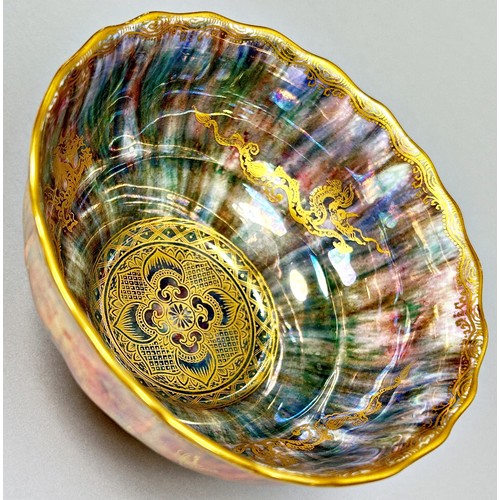 152 - Wedgwood lustre - circular bowl with fluted edge, the exterior with marbled toffee colour overlaid w... 