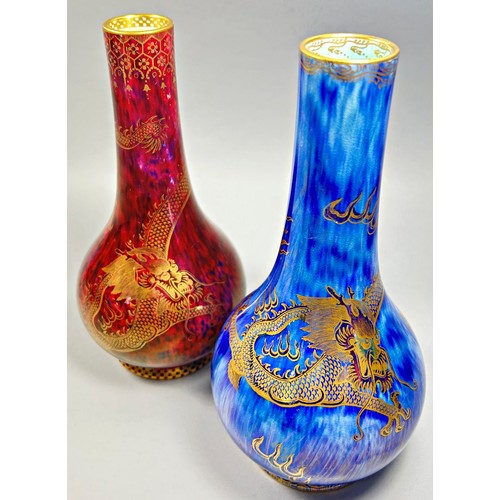 153 - Wedgwood lustre - near pair of bottle shaped vases with  mottled blue and mottled red exteriors over... 