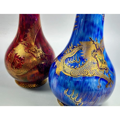 153 - Wedgwood lustre - near pair of bottle shaped vases with  mottled blue and mottled red exteriors over... 