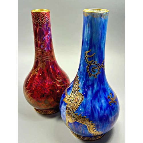 153 - Wedgwood lustre - near pair of bottle shaped vases with  mottled blue and mottled red exteriors over... 