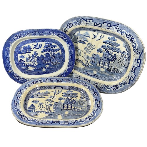 162 - Six graduated meat platters including Willow pattern examples and three further blue and white dinne... 