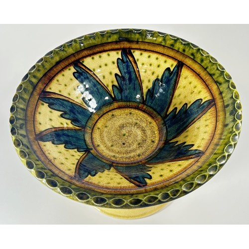 12 - A continental Majolica table centre, the circular dished top raised on a flared base