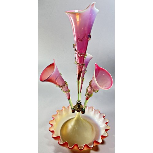 215 - A Victorian pale pink epergne with lily shaped vases and crimped bowl, 50cm high