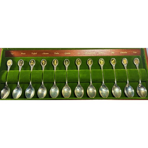 268 - A cased set of Twelve,  The Royal Horticultural Society Flower Silver Spoons with a certificate of A... 