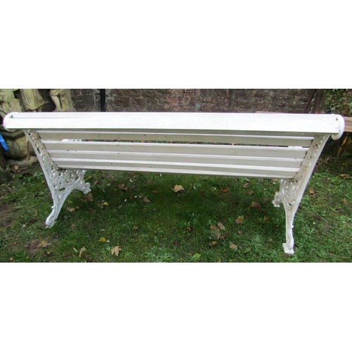 1023 - A 19th century garden bench with painted wooden slatted seat and combined back raised on decorative ... 