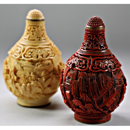 413 - Two small contemporary Chinese simulated ivory snuff bottles with relief mounted detail, one with ci... 