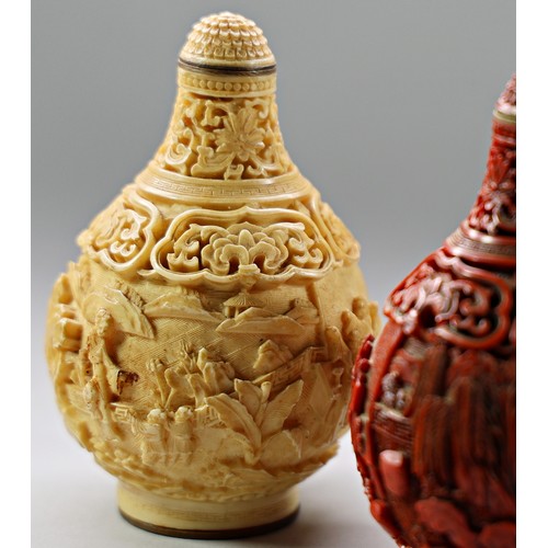 413 - Two small contemporary Chinese simulated ivory snuff bottles with relief mounted detail, one with ci... 