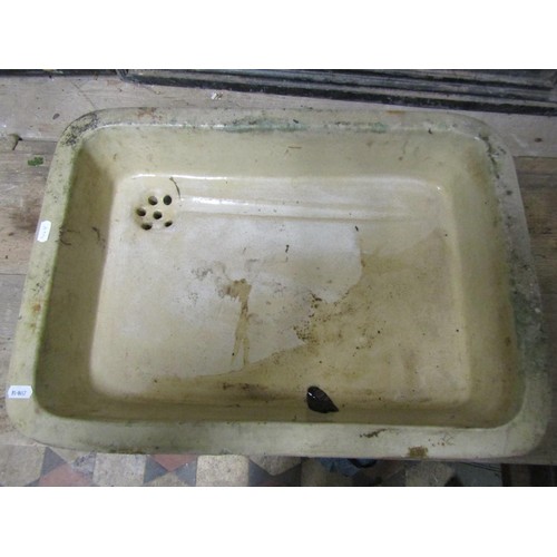 1039 - A shallow glazed rectangular stoneware sink with rounded corners and repeating moulded frieze, 12 cm... 