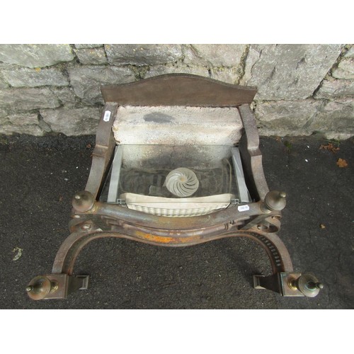 1040 - An electric Georgian style fire basket with serpentine front, urn finials and pierced grill, 57 cm h... 