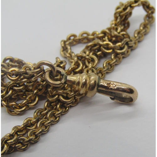 301 - Antique gilt metal long guard chain necklace with engraved pearl set slider, 66cm L approx