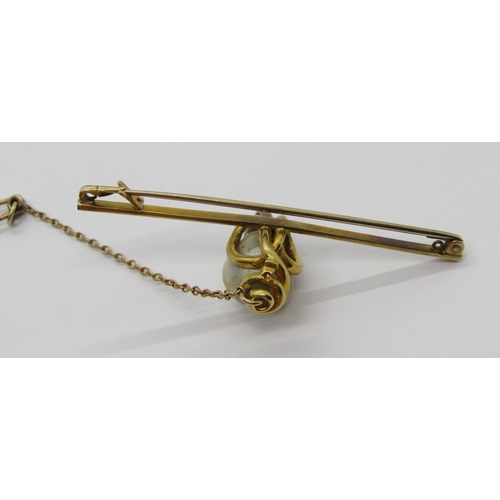 304 - Unusual antique yellow metal bar brooch in the form of a snake set with pear-cut garnet to head coil... 