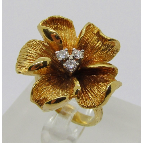 308 - Vintage 18ct naturalistic floral dress ring set with three diamonds, 0.15ct each approx, maker 'R&G'... 