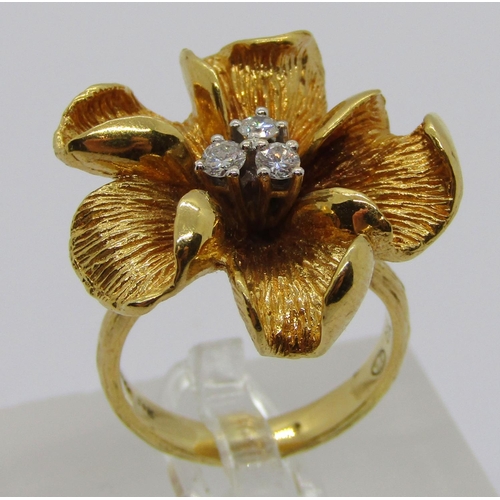 308 - Vintage 18ct naturalistic floral dress ring set with three diamonds, 0.15ct each approx, maker 'R&G'... 