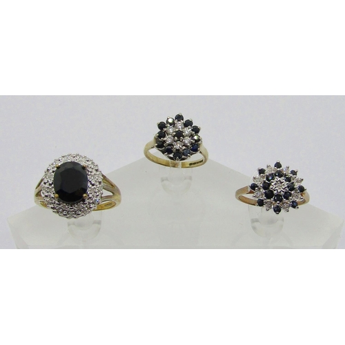 314 - Two sapphire and diamond cluster dress rings, 6.5g total and a further silver gilt sapphire and simu... 