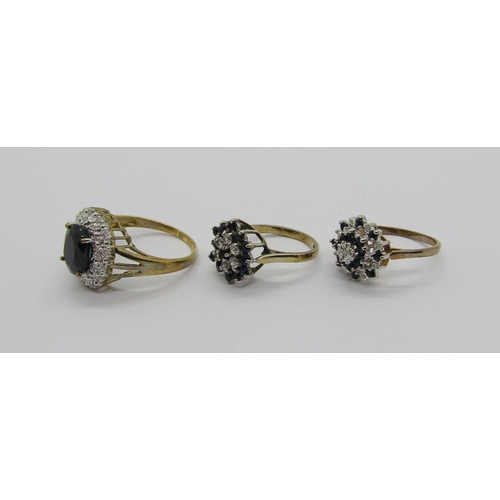 314 - Two sapphire and diamond cluster dress rings, 6.5g total and a further silver gilt sapphire and simu... 